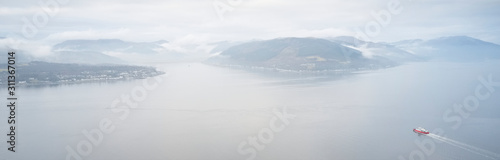 Fotografie Ferry ship crossing on open vast ocean cruise journey aerial view from above dur