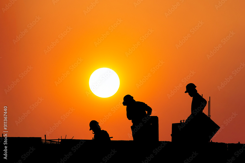 Silhouette workers under construction and construction site.