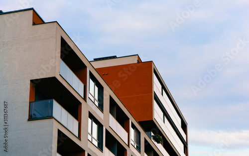 New luxury apartment building exterior with reflex