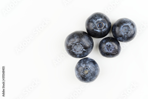 Directly above of fresh blueberries isolated on white background