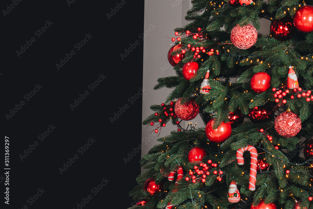 Christmas and New Year decorations with lights. Concept and holiday background. Postcard, announcement, congratulation.