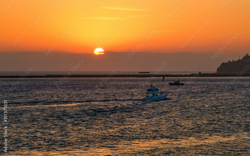 Fishing Boats Returning at Sunset