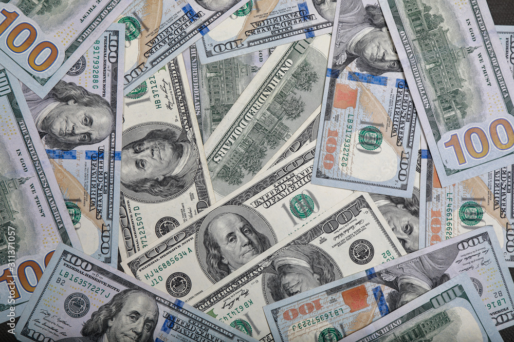 different dollar bills as background different dollar bills as background