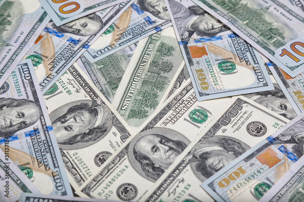 different dollar bills as background different dollar bills as background