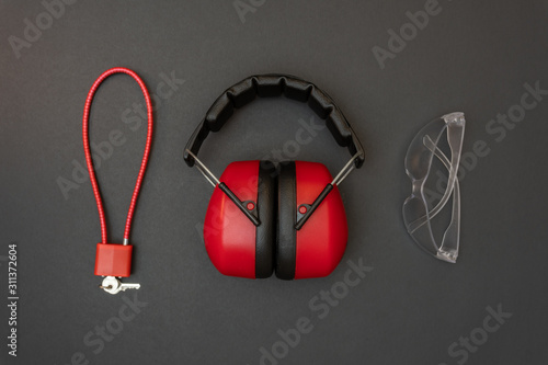 Gun safety equipment. Cable lock, hearing protection, and eye protection.