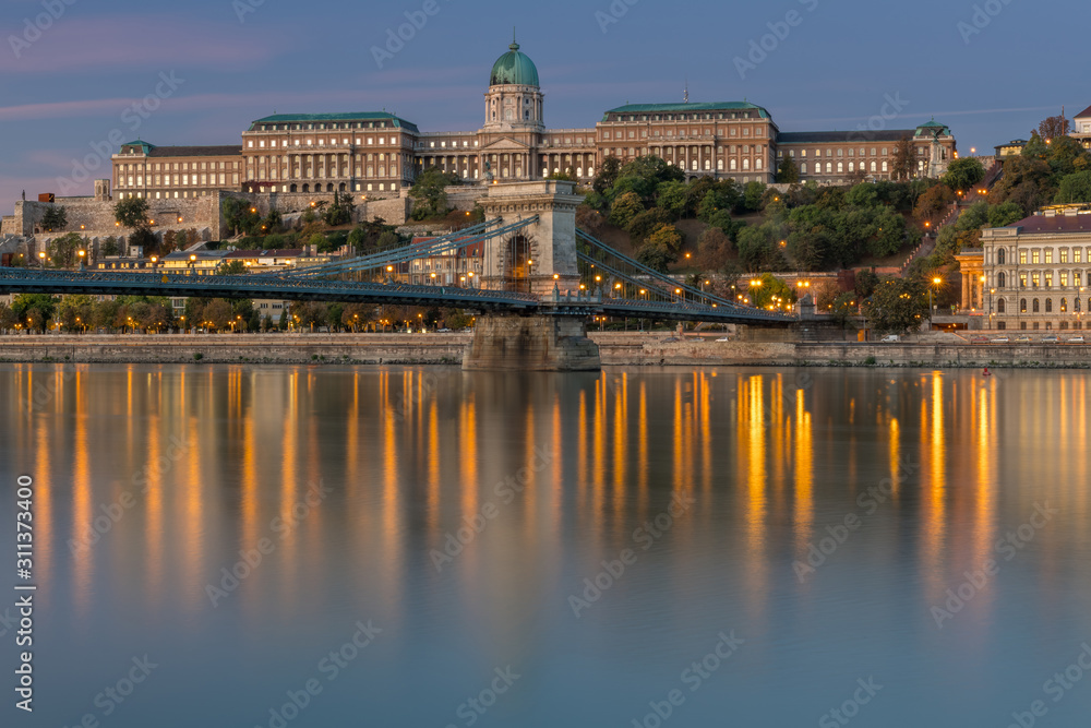 Sunrise in Budapest, Chain Bridge with the castle palace in the background.
