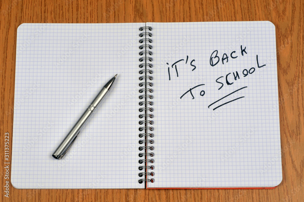 It's back to school written on notebook It's back to school written on notebook