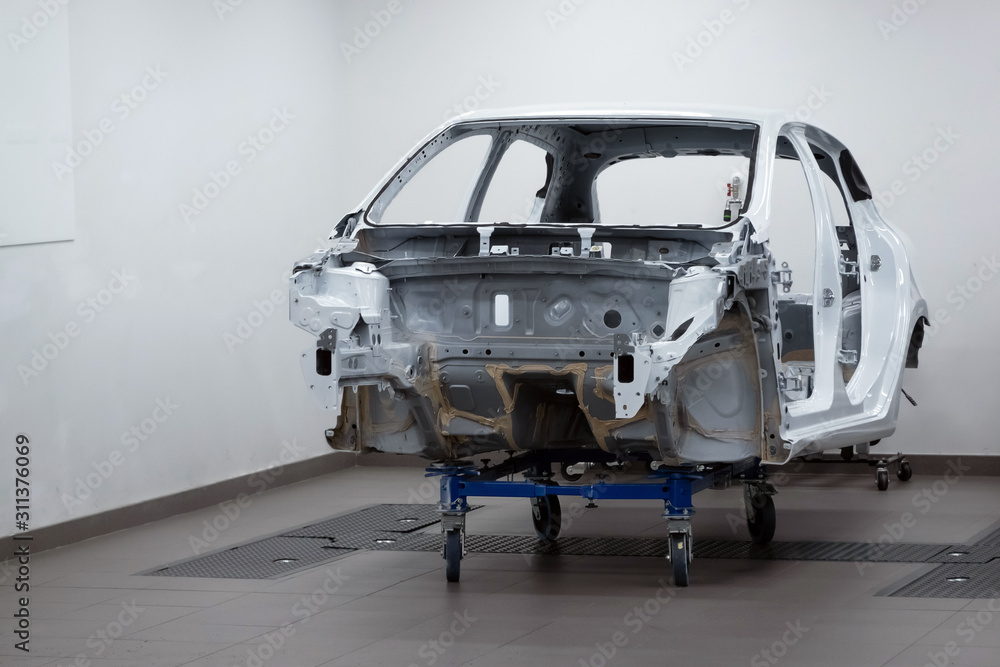 Custom car being build in Sports car body, car frame is