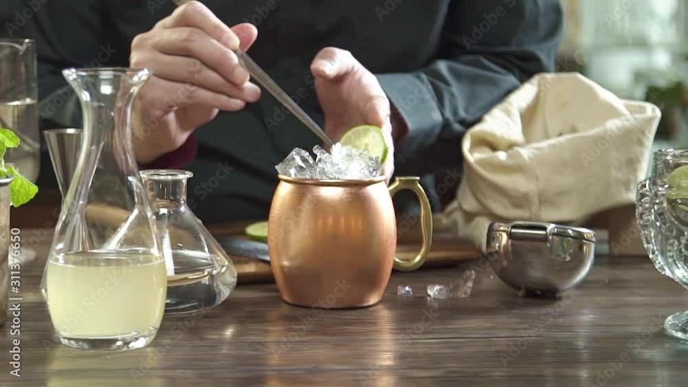 Arrange Lime Slices with Garnish Tong - Slide Right to Left Arrange Lime Slices with Garnish Tong - Slide Right to Left