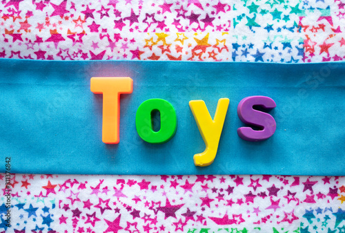 the word toys on a colorful background7 photo