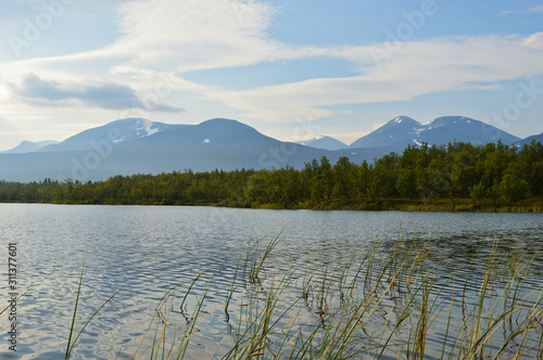 Lakes, rivers and mountains in the national park Abisko in Sweden photo