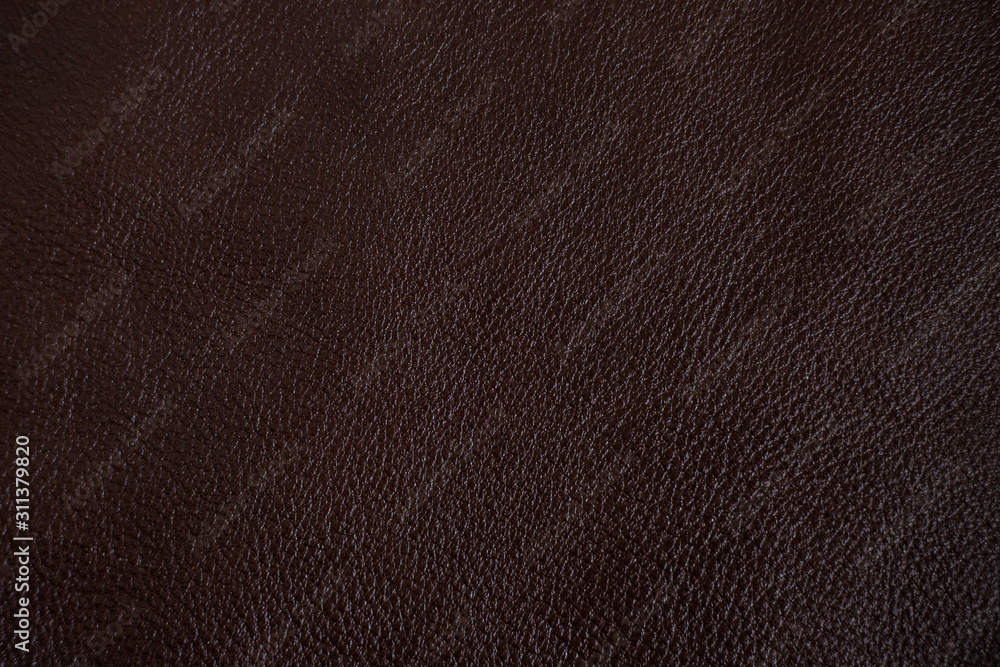 Genuine dark brown full grain leather texture Genuine dark brown full grain leather texture