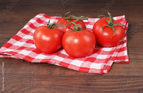 Tomatoes on decorative cotton napkin