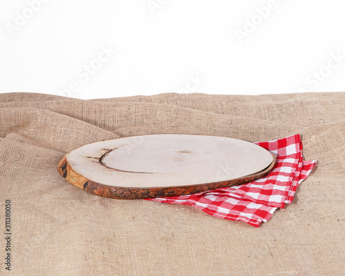 Wooden board on burlap hessian sacking