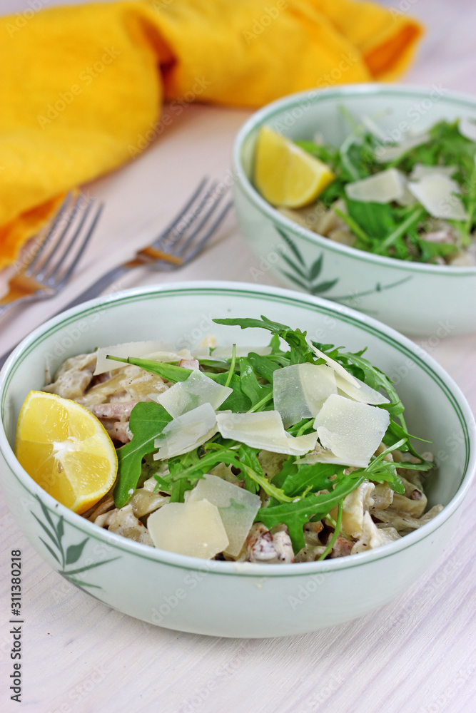 creamy pasta with bacon and arugula creamy pasta with bacon and arugula