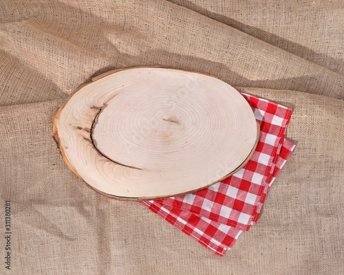 Wooden board on burlap hessian sacking