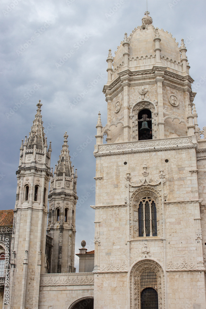 Jeronimos monastery exterior. Ancient abbey in Lisbon. Facade of monastery of St Jerome, Portugal. Unesco world heritage. Religious building. Famous cathedral in district Belem in Lisbon.