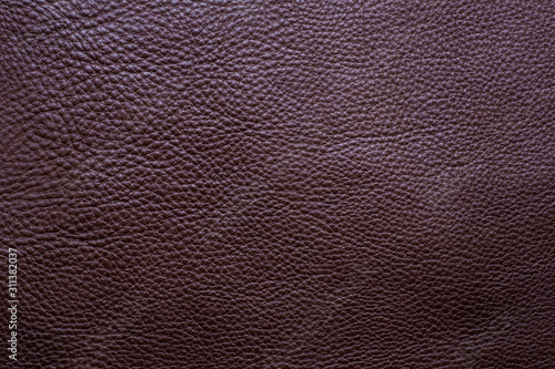 Genuine dark brown full grain leather texture