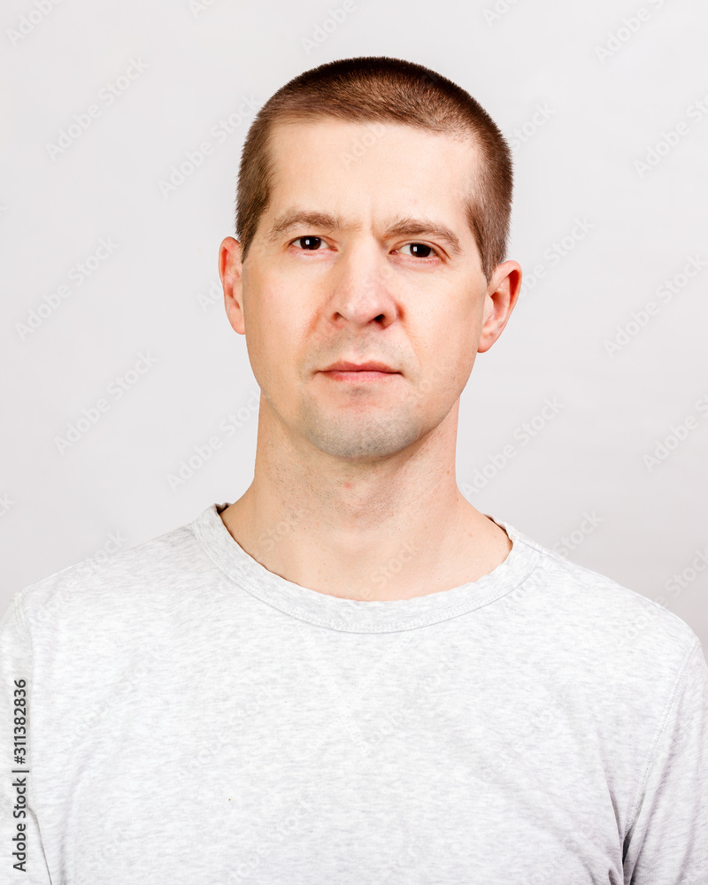 Fototapeta premium Man with short hair on white background