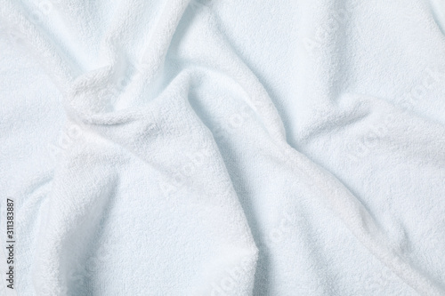 White crumpled towel textured background, close up