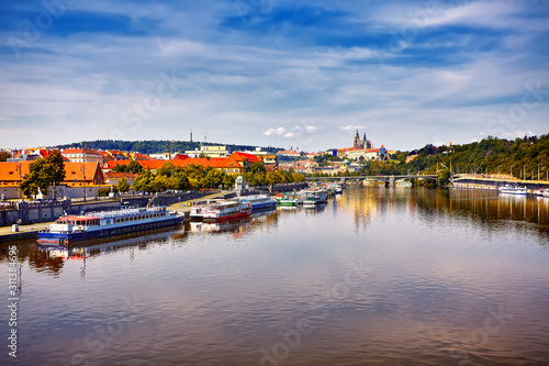 Scenic sunset aerial view of the Old Town pier architecture over Vltava river in Prague, Czech Republic