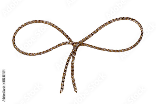 Gift bows. Closeup of a gold white rope bow isolated on a white background. Macro photograph.