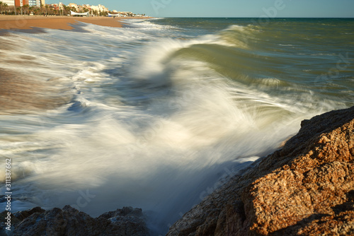 Waves sea coast beach storm.