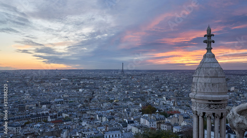 Panoramic aerial view of the Paris and Eiffel Tower at sunset from the top of Montmartre, France.