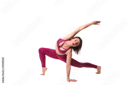 Sporty young woman doing yoga practice