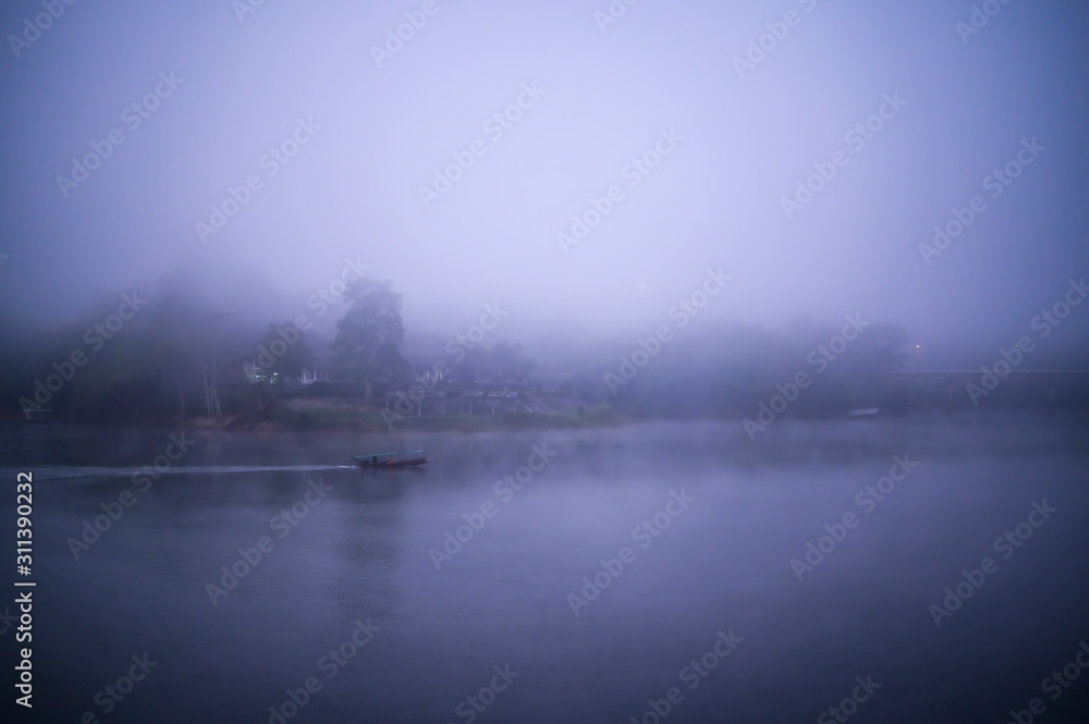 fog over river in the city fog over river in the city