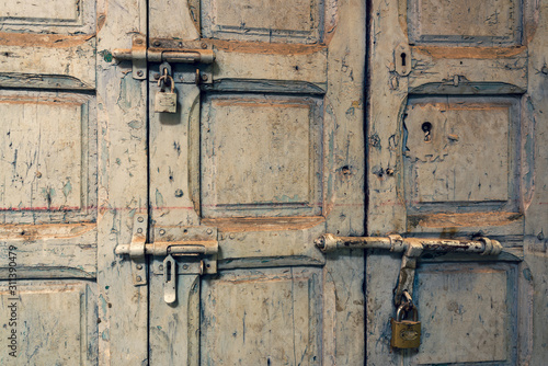 gray wooden door in marrakech