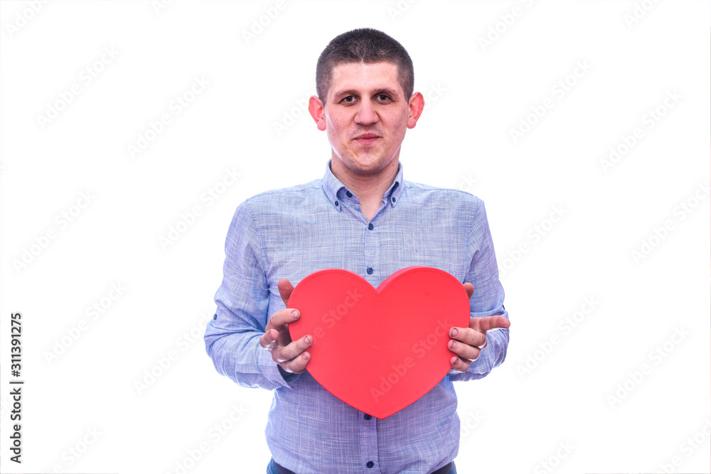 Man holding red heart isolated on white Man holding red heart isolated on white