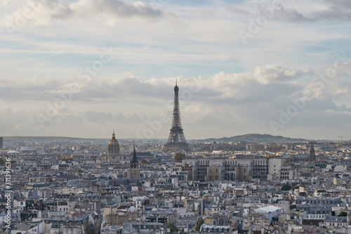 Paris, Eiffel Tower, France. Cityscape. Panoramic view from the top of the Notre Dame cathedral. Overcast weather.