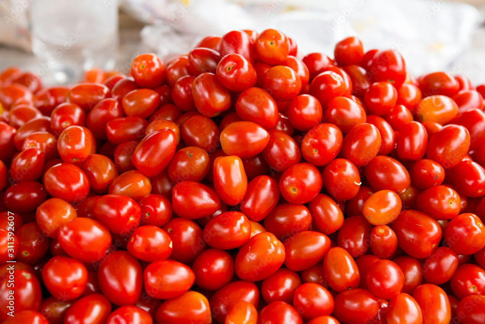 Red tomatoes. Tomato background. cherry tomato. Group of fresh tomatoes. Red tomatoes. Tomato background. cherry tomato. Group of fresh tomatoes.