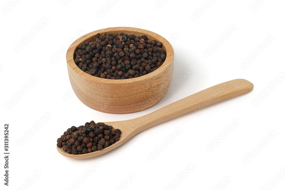Black pepper in wooden bowl and wooden spoon  isolated on white background with clipping path