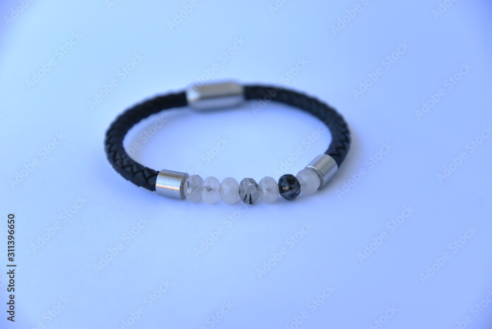 Man Bracelet With Quartz on the Table