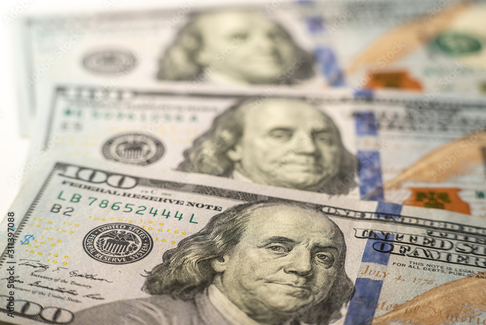 100 dollars bills close-up and portrait of Benjamin Franklin on US cash bill 100 dollars bills close-up and portrait of Benjamin Franklin on US cash bill