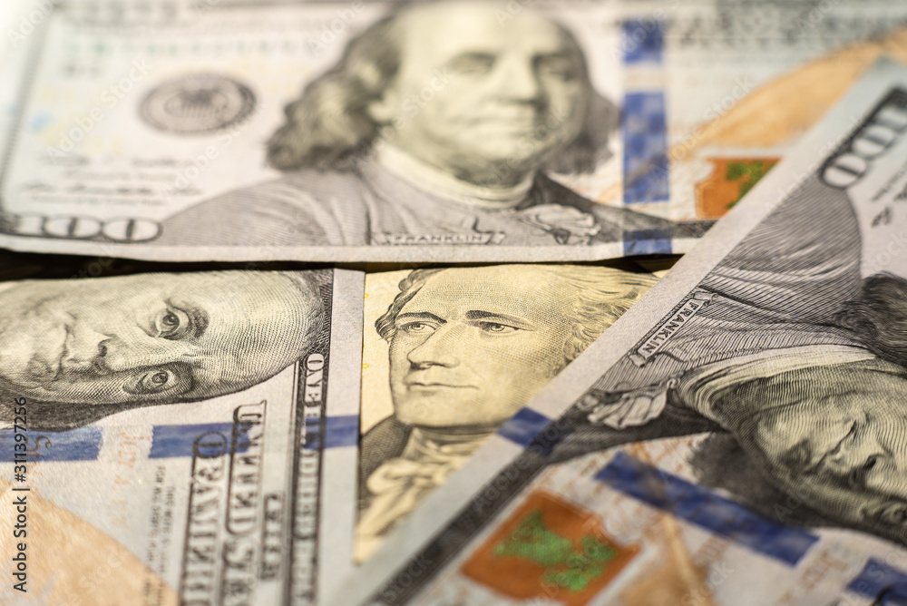 Close up of different dollar bills as background. Amarican dollars pattern. Top view of business concept. Close up of different dollar bills as background. Amarican dollars pattern. Top view of business concept.