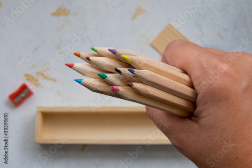 wooden pencil case with colour pencils for back to school