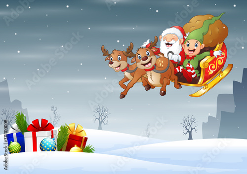 Santa claus with his sleigh landed on a snowy hill
