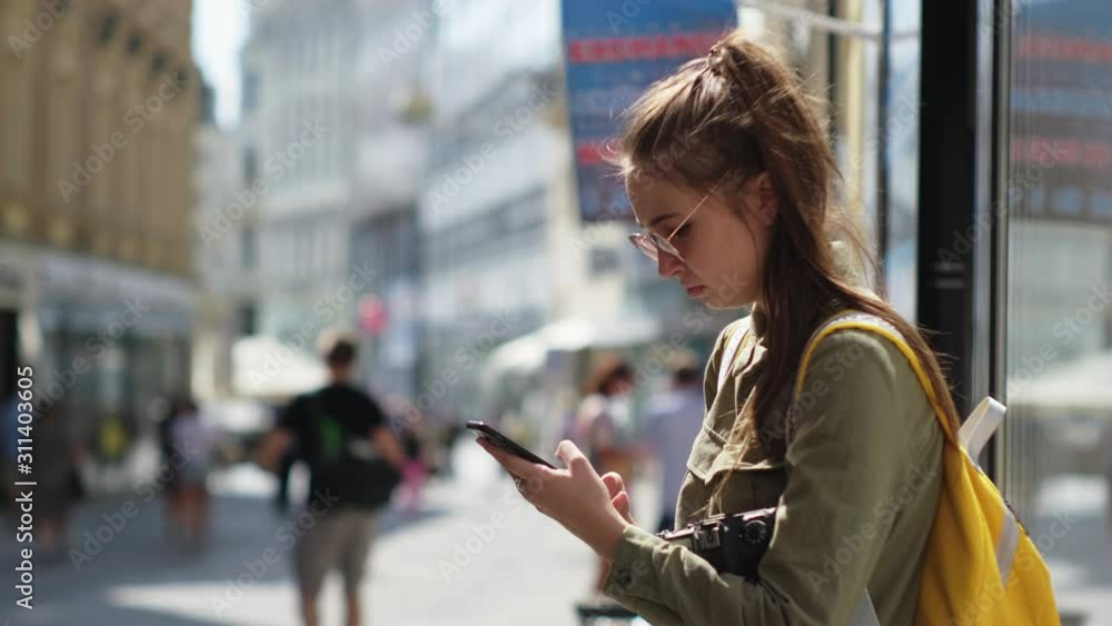 Urban girl with cellphone in the street Urban girl with cellphone in the street