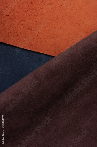 abstract background of tanned leather, different colors. copy space