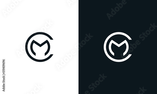 Minimalist line art letter round MC logo. This logo icon incorporate with letter M and C in the creative way. photo