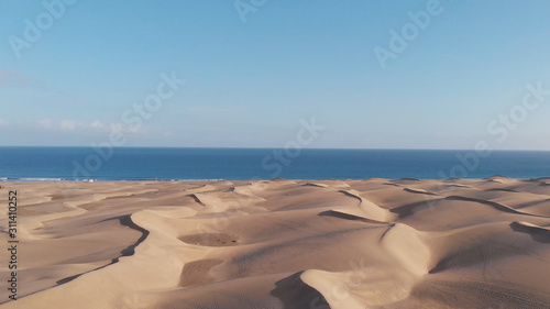 Panoramic view from the height of a natural landmark - sand Sahara in Spain - Maspalomas  Gran Canaria