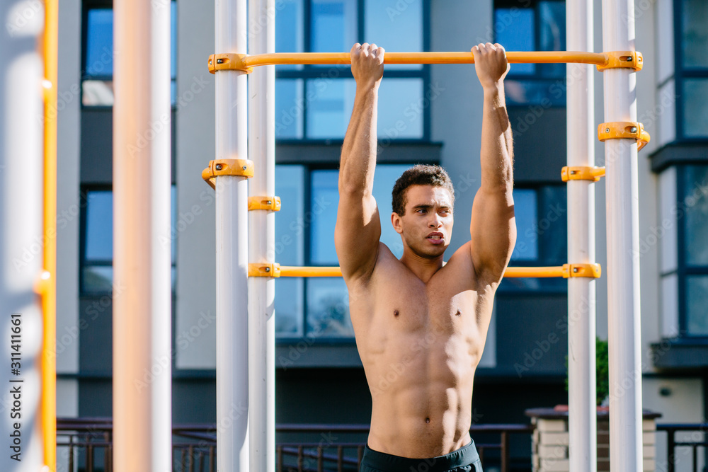Naked torso man looking away, relaxing after exercises. Sport, lifestyle and people concept. Naked torso man looking away, relaxing after exercises. Sport, lifestyle and people concept.