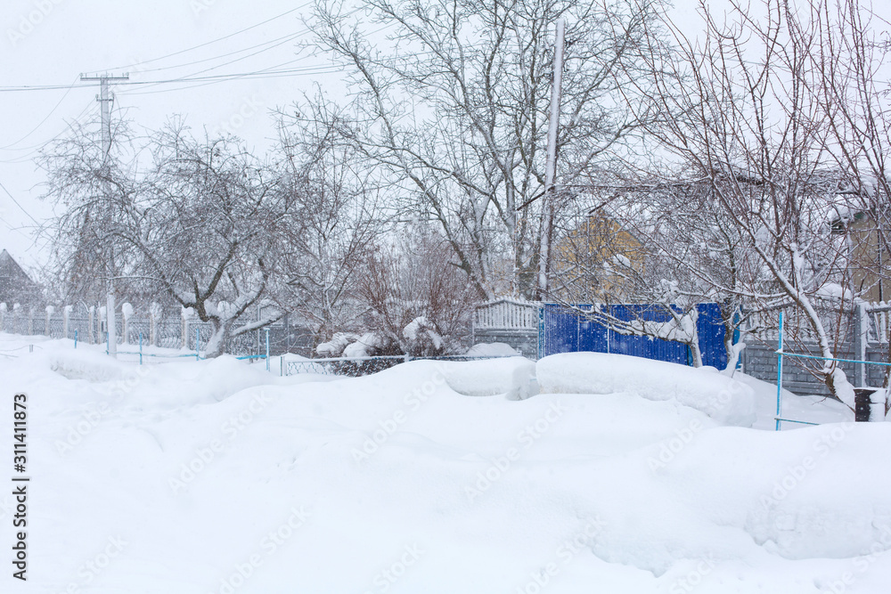 Winter, rural streets are covered with snow. Snow blizzard Winter, rural streets are covered with snow. Snow blizzard