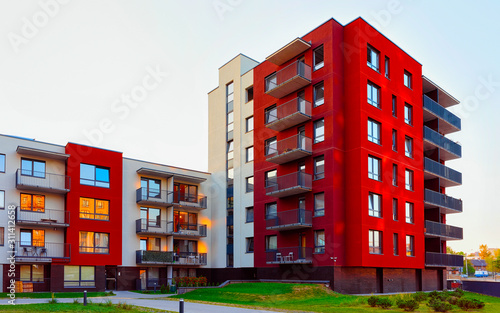 Apartment in residential building exterior. Housing structure at blue modern house of Europe. Rental home in city district on summer. Architecture for business property investment, Vilnius, Lithuania.