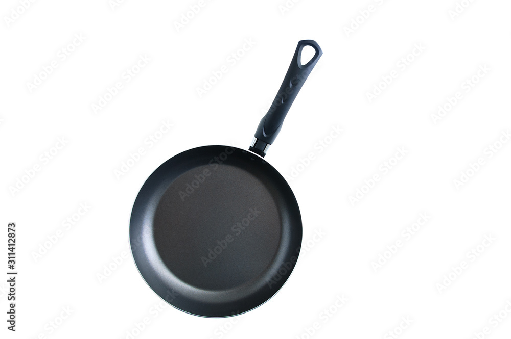 Black metal pan with non-stick coating. White isolate. Black metal pan with non-stick coating. White isolate.