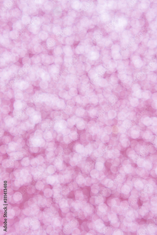 Abstract festive background .Christmas and New Year holidays glitter bokeh, glitter, bluer. Pink color. Abstract festive background .Christmas and New Year holidays glitter bokeh, glitter, bluer. Pink color.