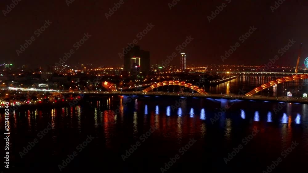 Aerial approaching head dragon bridge,Da Nang,Vietnam in 4k at night. Aerial approaching head dragon bridge,Da Nang,Vietnam in 4k at night.